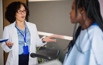 Doctor cosulting patient following exam