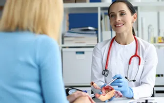 Doctor explaining reproductive system