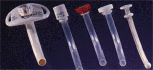 Uncuffed tracheotomy tubes photographed against a black back